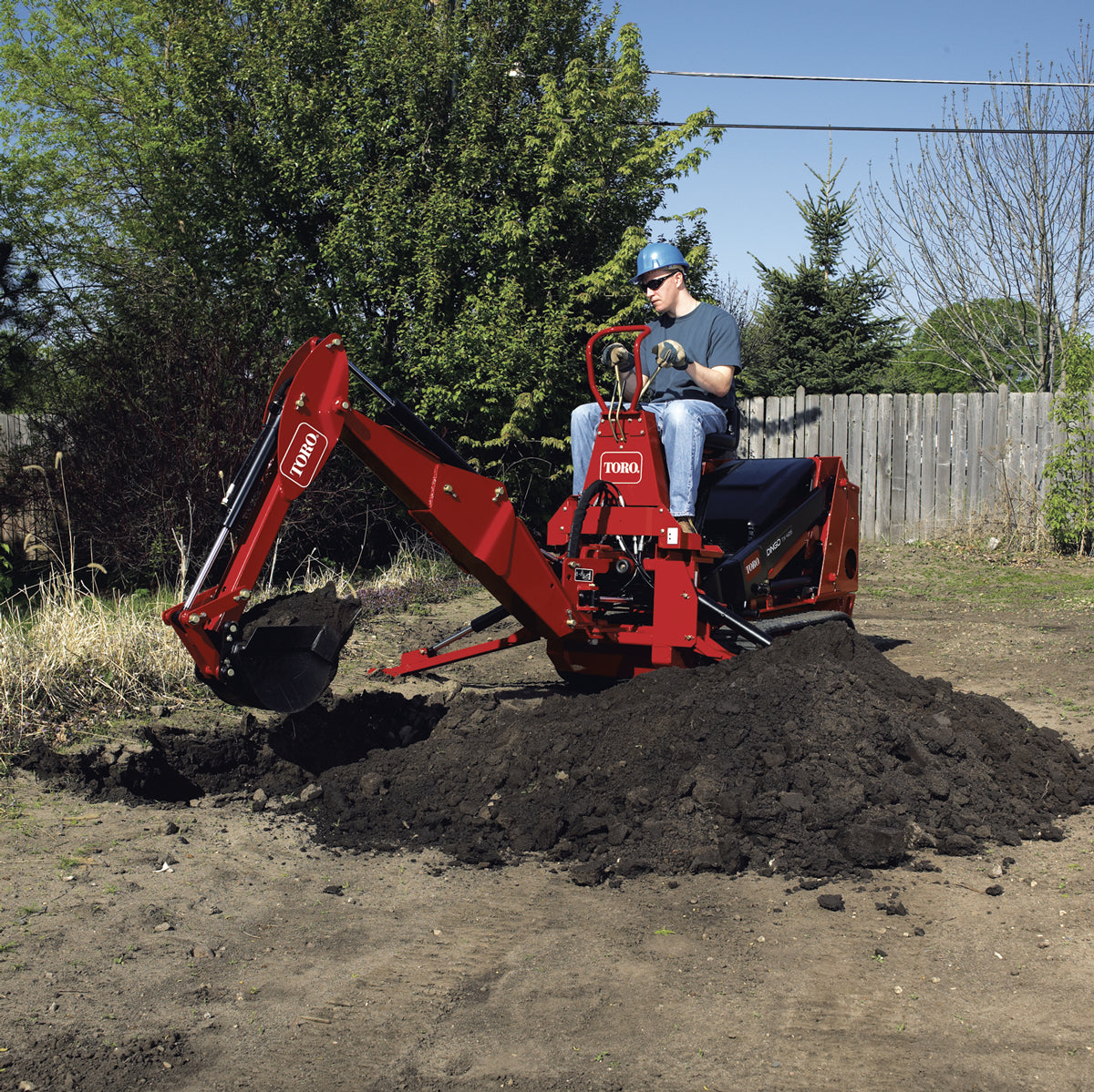 Toro Dingo Backhoe with 13" Bucket Attachment