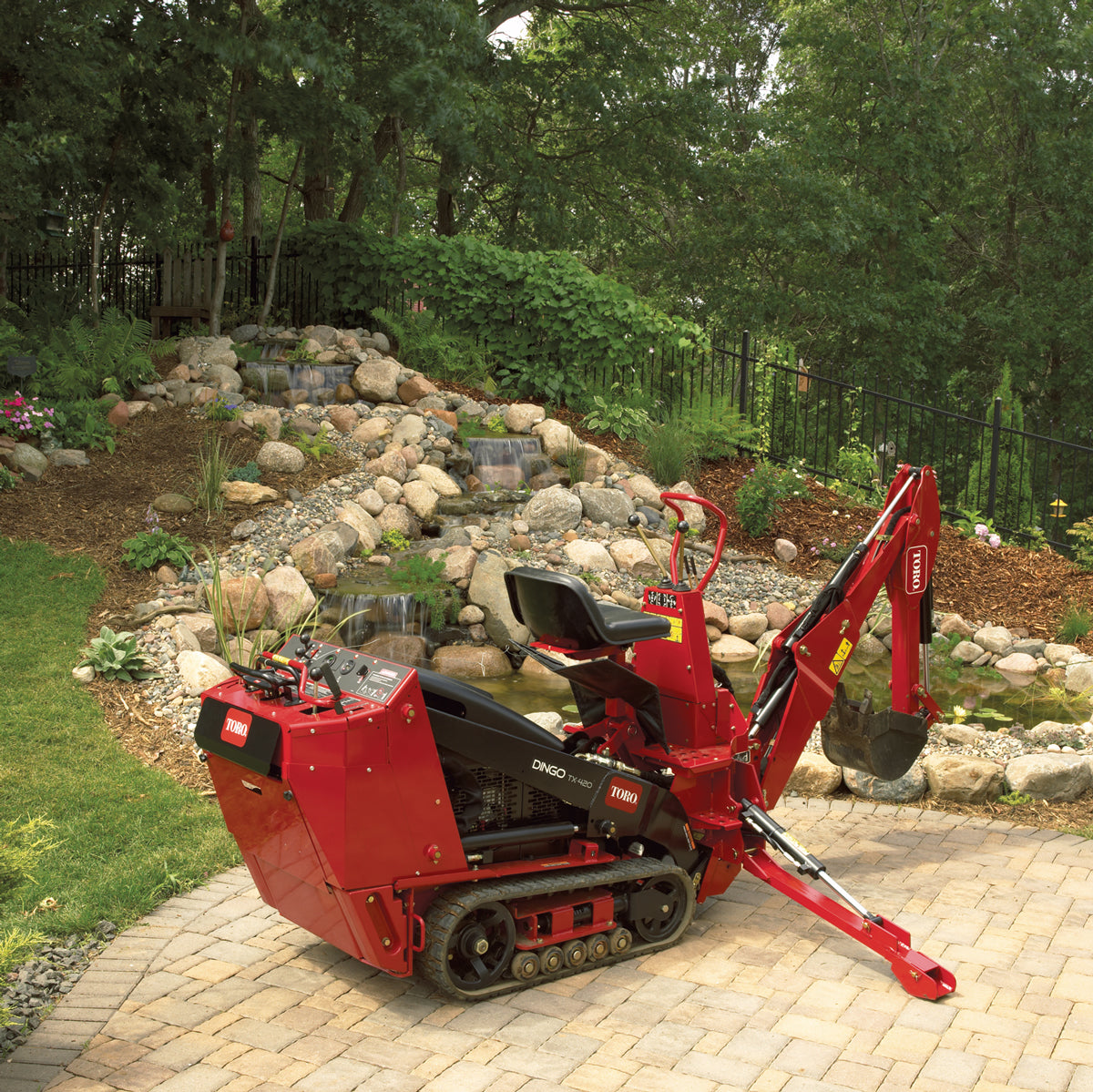 Toro Dingo Backhoe with 13" Bucket Attachment